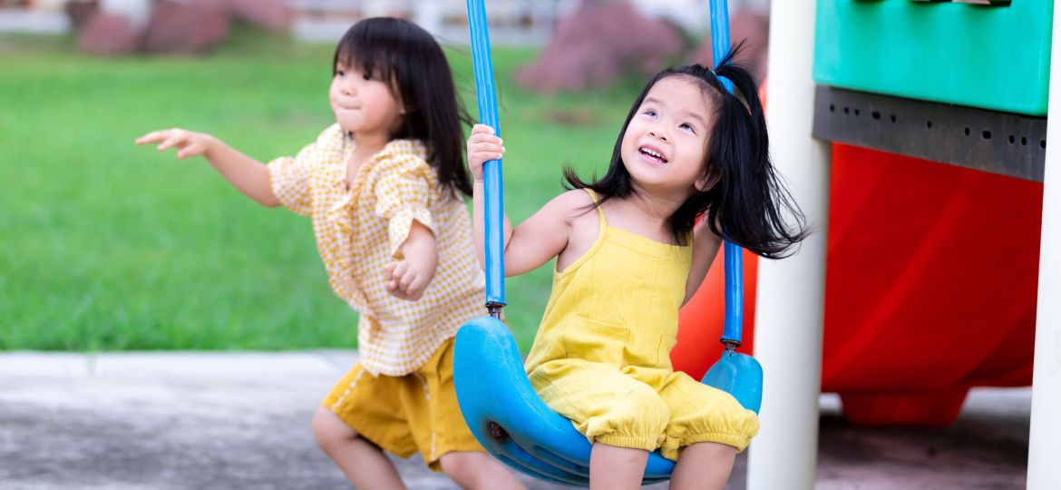 sisters-play-happy-swings-older-sister-swing-and-2026-01-07-05-27-34-utc